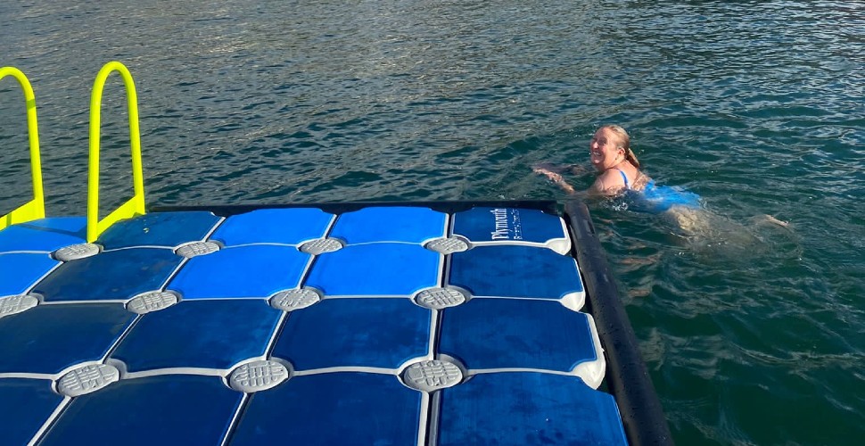 Wild swimmer in the Sound next to new pontoon 